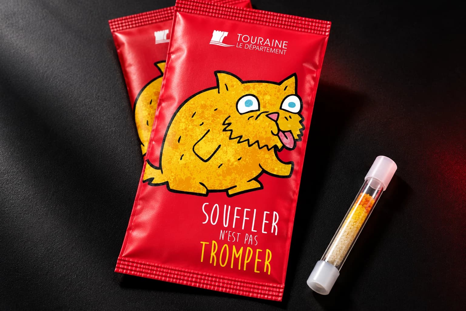 Simulation de l’éthylotest en sachet rouge sur fond anthracite, avec le visuel Souffler n’est pas tromper